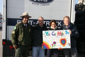 Dave with NYC Park Ranger and Mayor Bloomberg volunteers in front of Trinity trucks in the Rockaways-12cfdac7
